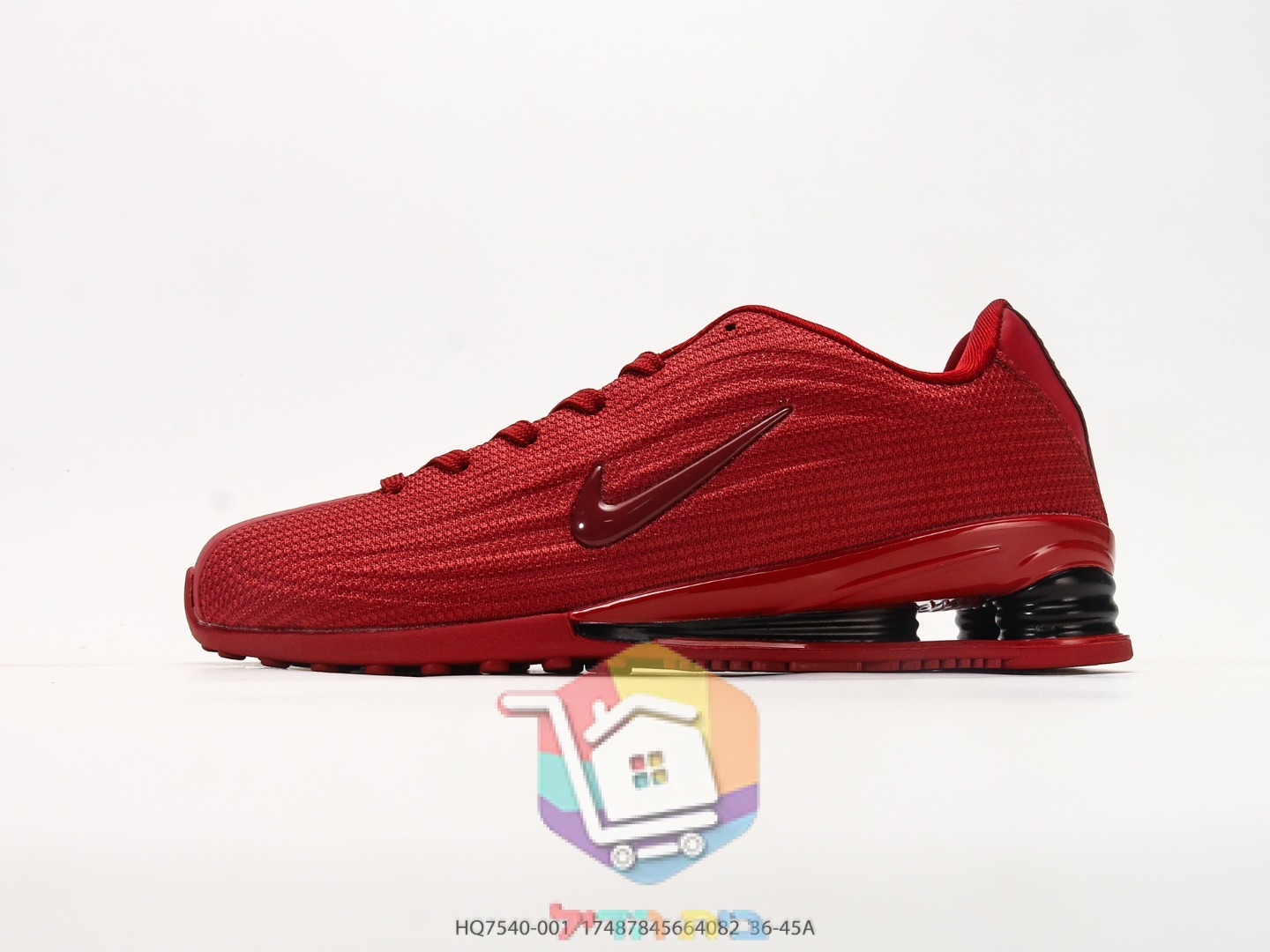 נעלי ריצה Nike Shox אדומות עם עמודי בלימה שחורים בעקב