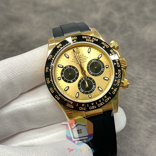 שעון Rolex Daytona בגוון זהב על רצועת גומי, 40 מ"מ 9