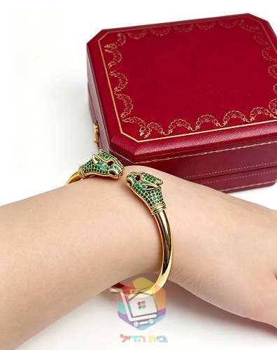 צמיד קשיח Cartier עם שני ראשי פנתר 12
