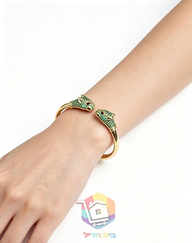 צמיד קשיח Cartier עם שני ראשי פנתר 13