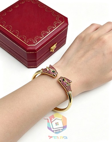 צמיד קשיח Cartier עם שני ראשי פנתר 21